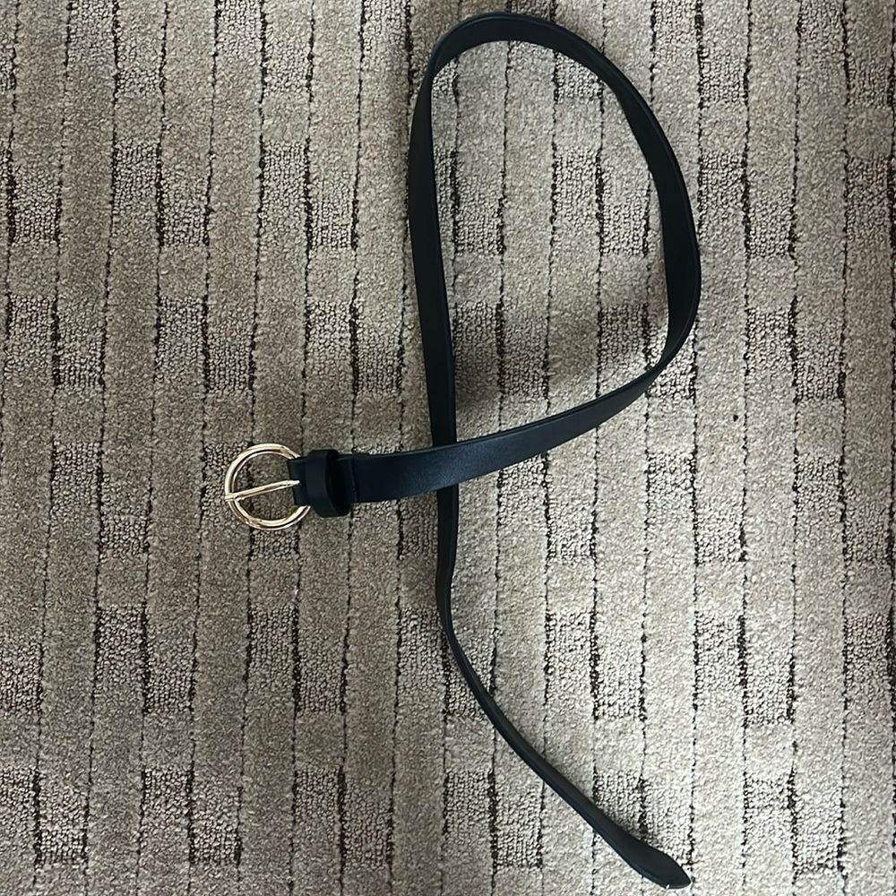 Gold circle black belt